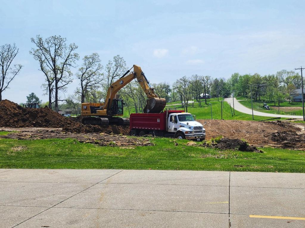 Dirt being transfered to dumptruck 