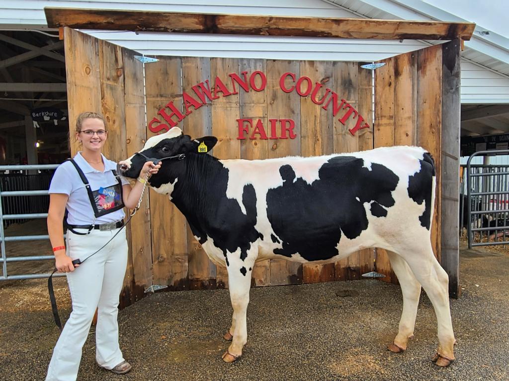 Andrea Race - My daughter, Kendra Strebel after showing her heifer at the Shawano County Fair.