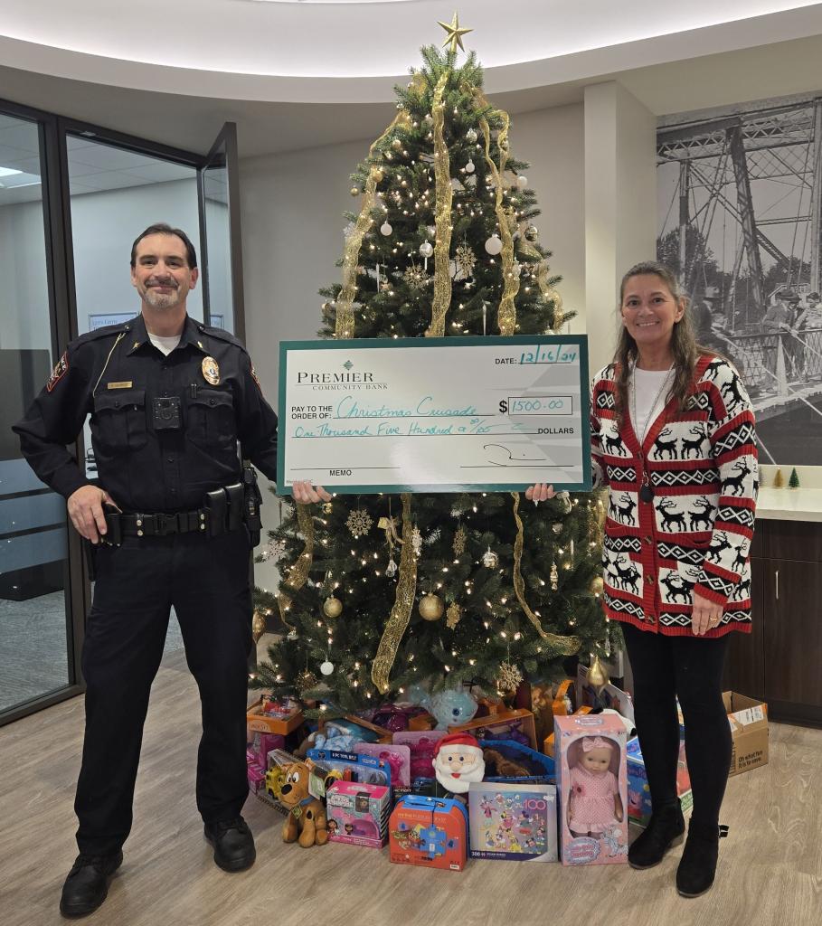 Spreading Holiday Cheer: Winneconne Office Donates $1,500 and Toys to Christmas Crusade!